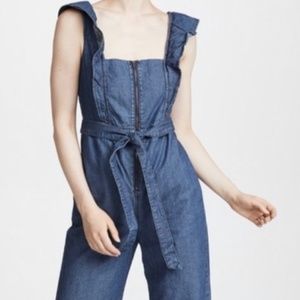 Free People Tied Denim Ruffle Jumpsuit.